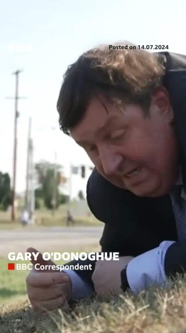 Many defended the reporter for remaining on the ground. (BBC)