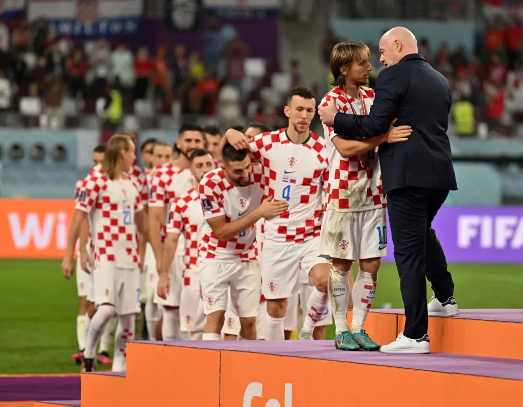 Infantino wearing bespoke Stan Smith trainers at the 2022 World Cup third-place playoff (Harold Cunningham/Getty Images)