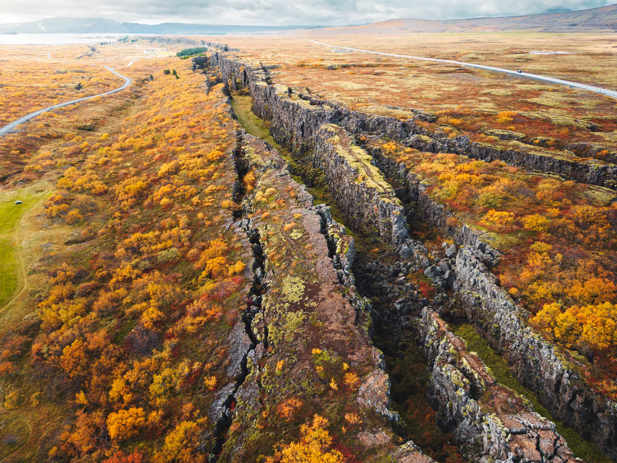 Tectonic plates also cause mountainous areas to appear when they collide (Getty Stock)