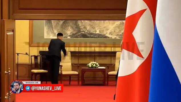 North Korean staff appear to be wiping down the area where the Supreme Leader was sat (Telegram/@Yunashev_Live)
