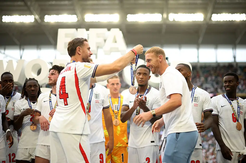 Jordan Henderson gives Jason Steele a medal (Jared C. Tilton - FIFA/FIFA via Getty Images)