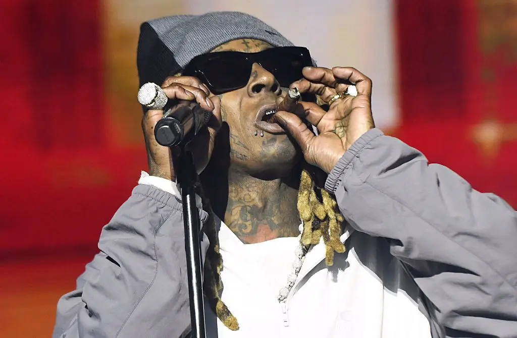 Working with Lil Wayne sounds hard (Tim Mosenfelder/Getty Images)