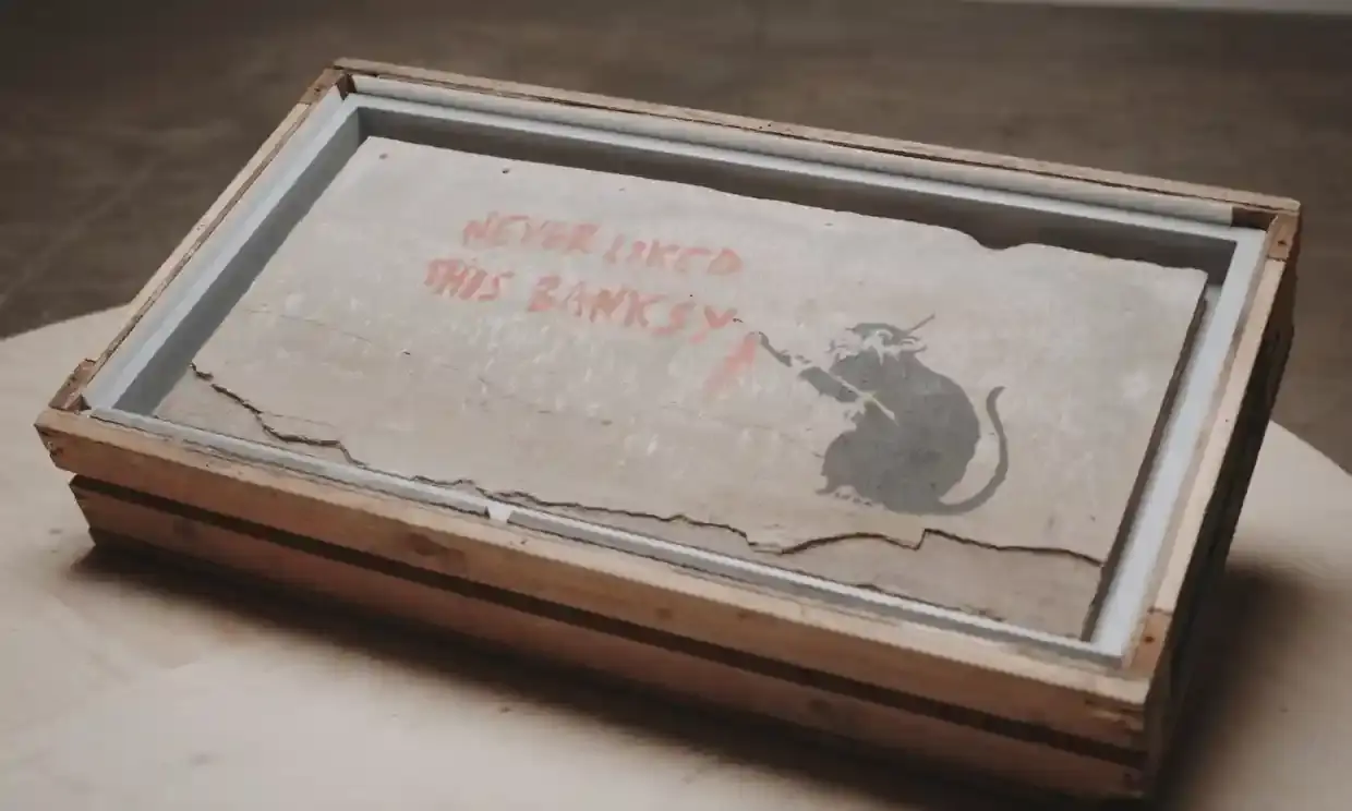 The inclusion of the 'Banksy' piece was framed around the fact that it was selling for a 'huge' sum of money despite its uncertainty.