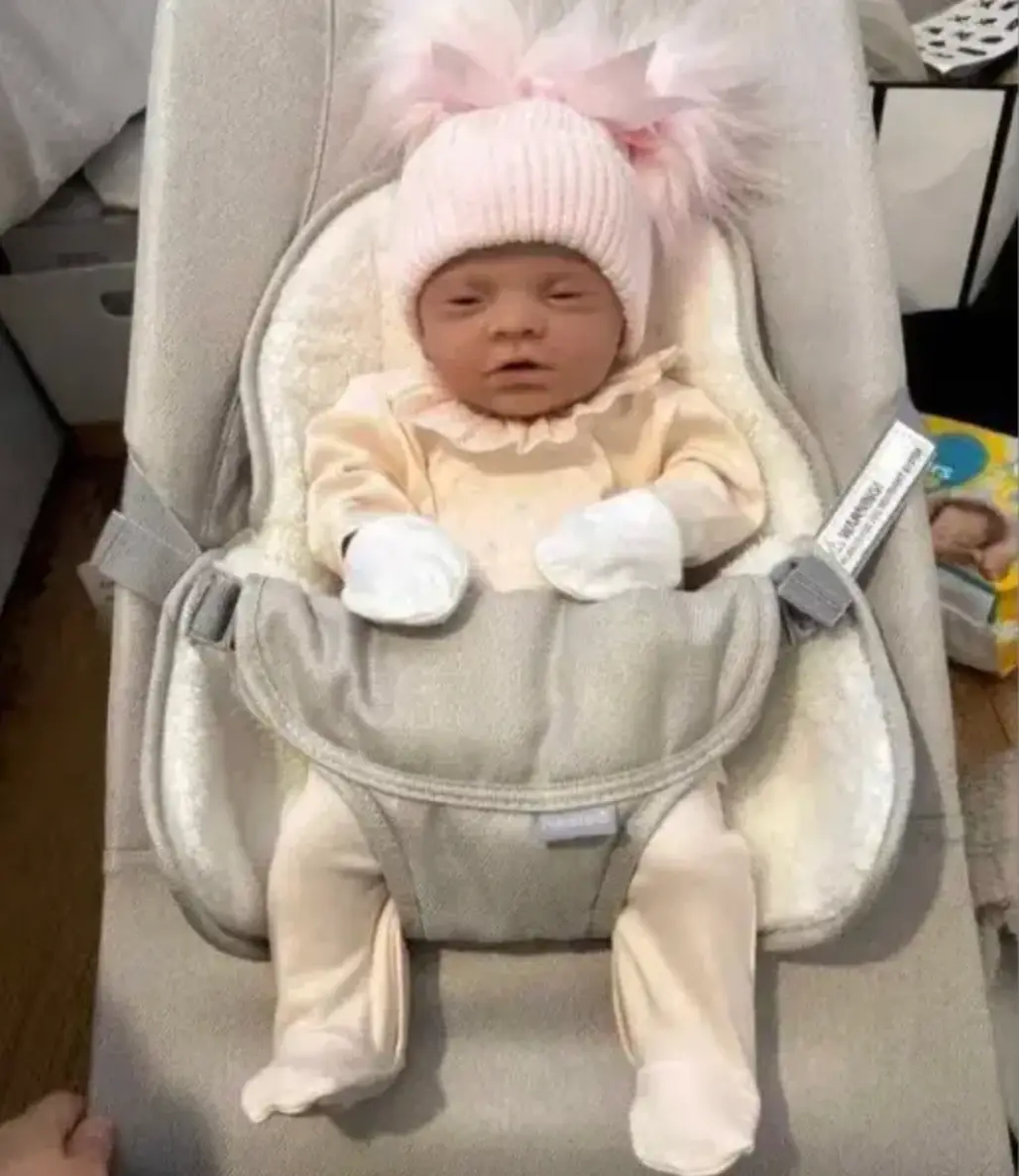 She dressed the doll up in baby clothes (Facebook)