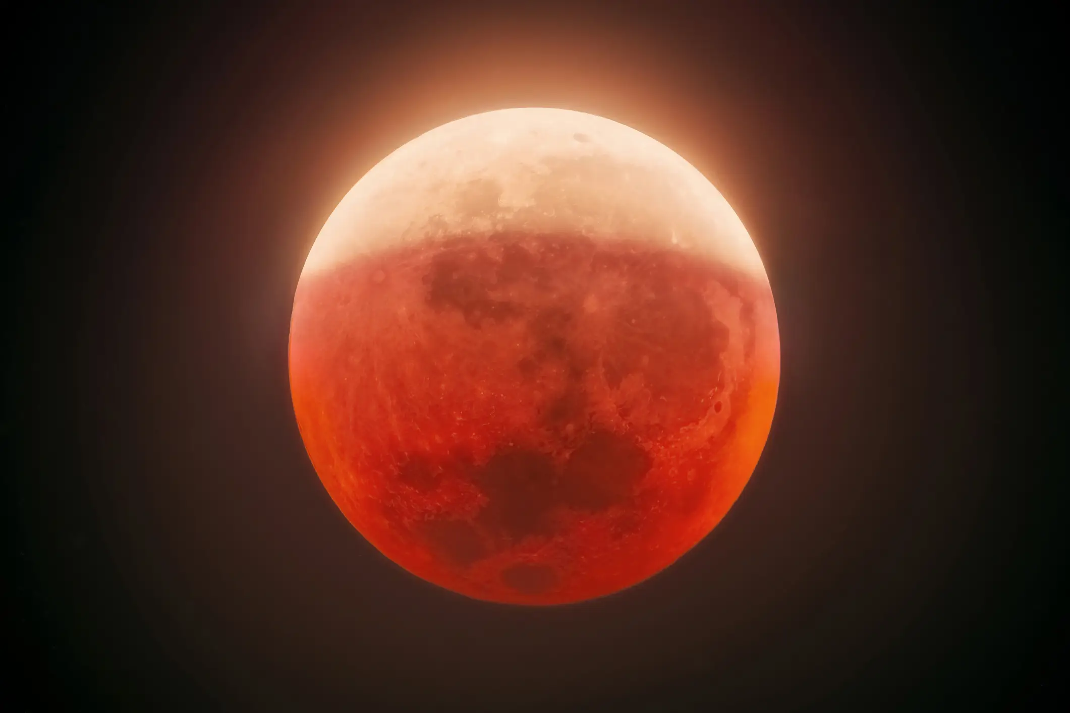 Moon experiencing a partial lunar eclipse (Getty)