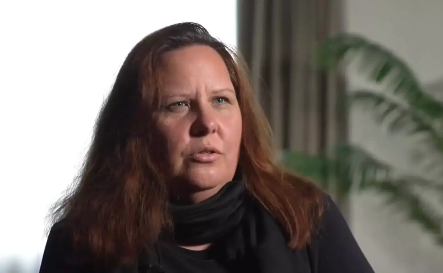 Christine Dawood lit candles in memory of her husband and son. (BBC)
