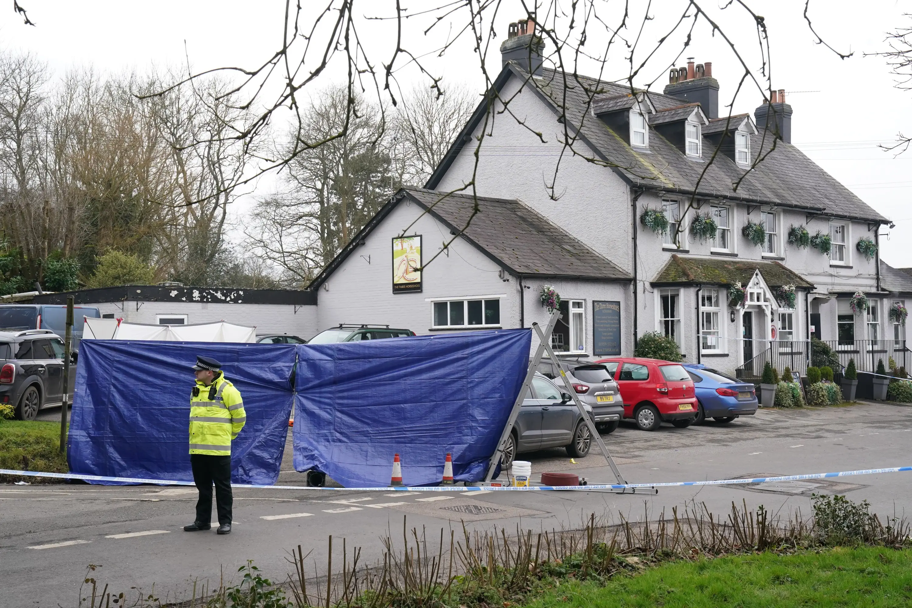 Police have cordoned off the Three Horseshoes pub where the shooting took place (Gareth Fuller/PA Wire)