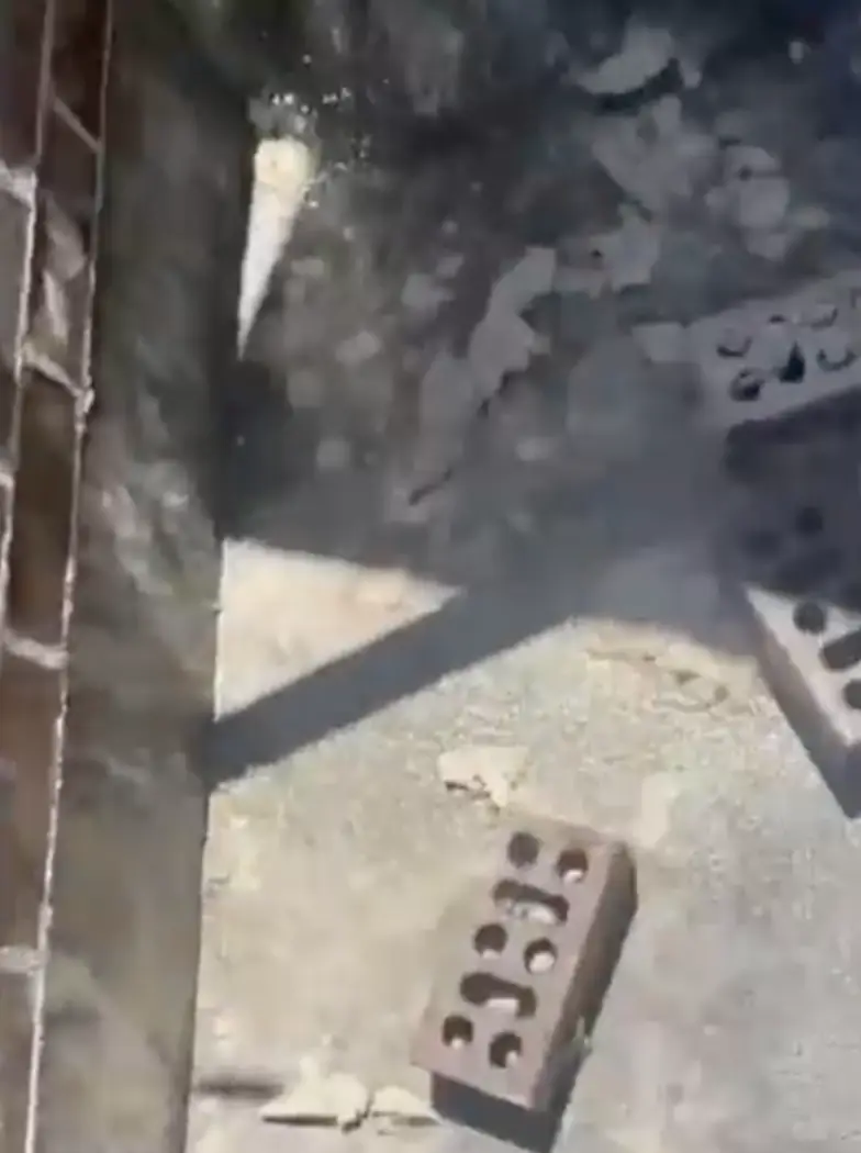 The dispute allegedly first started over issues of rainwater flows.