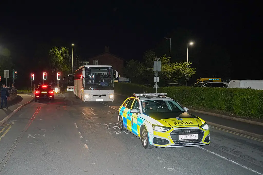 Passengers being transported to a hospital on the Wirral (Ioannis Alexopoulos/Anadolu via Getty Images)