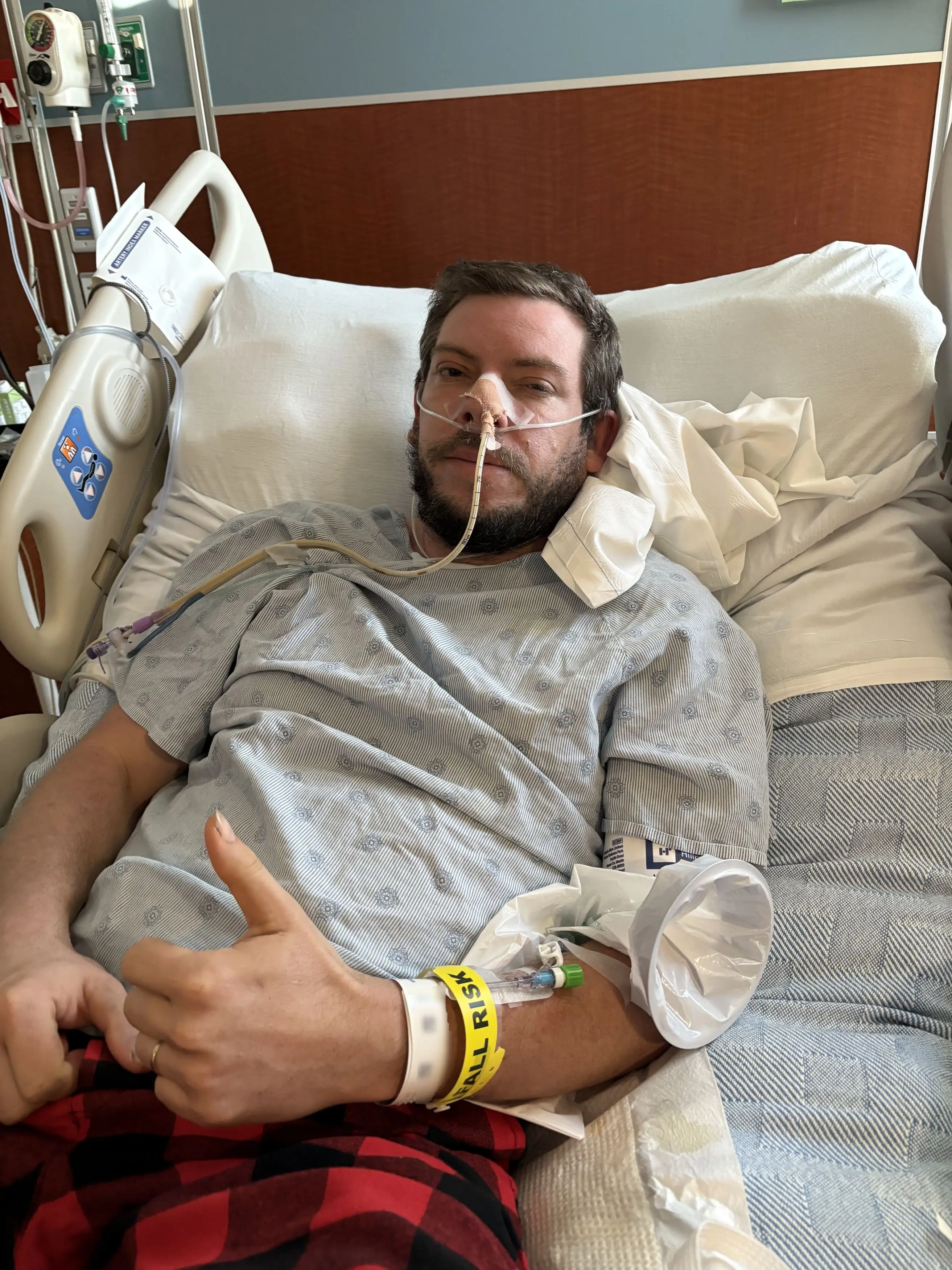 The young and healthy dad nearly died from 'sneezing to hard' (Kennedy News and Media)