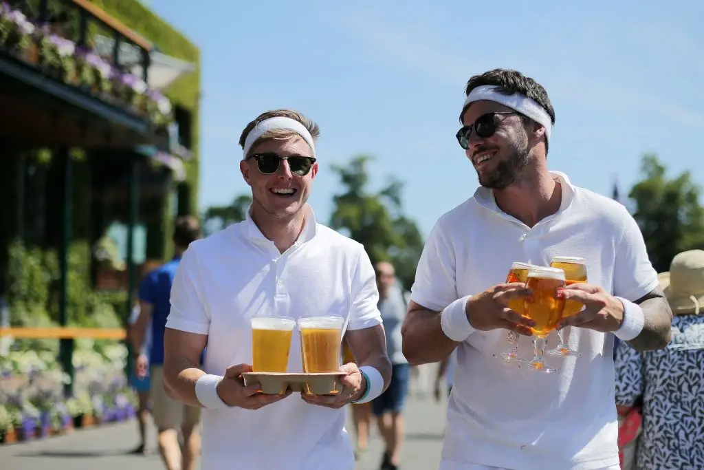 Wimbledon's not really the place for chucking drinks into the air, tennis just has too many points for that to be affordable. (DANIEL LEAL/AFP via Getty Images)