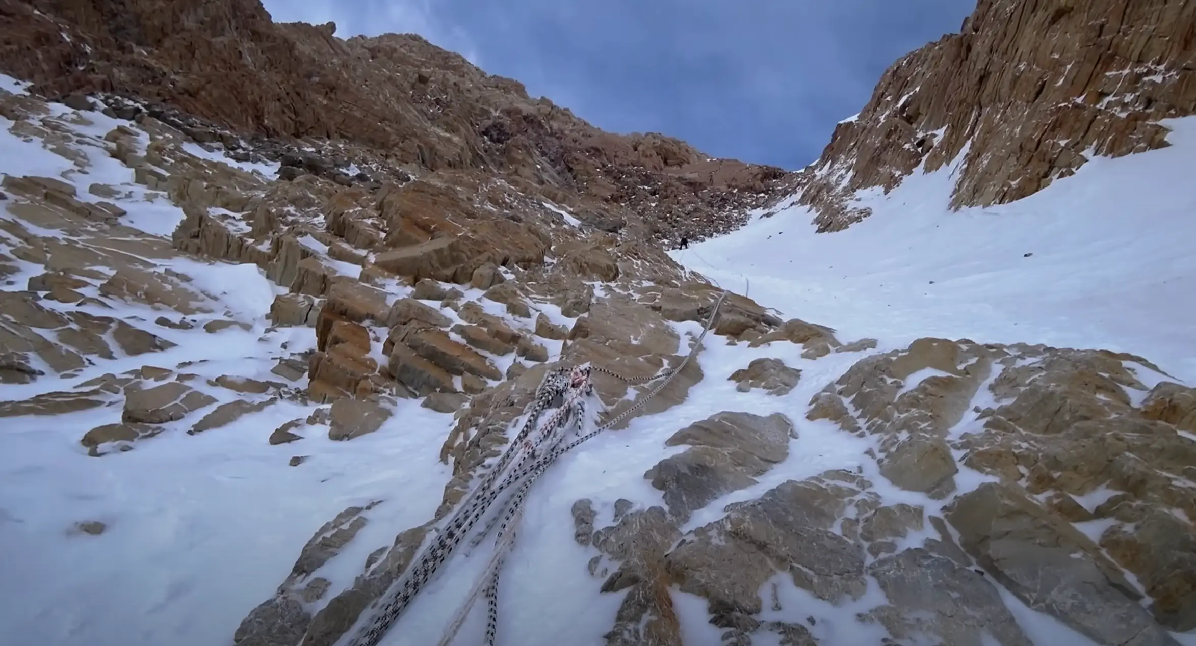 She was stuck 22,965 ft up the 24,406 ft peak (YouTube/Dmitry Sinitsyn)