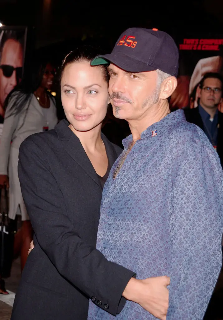 The pair have since explained why Jolie wore the vial (Frank Trapper/Corbis via Getty Images)