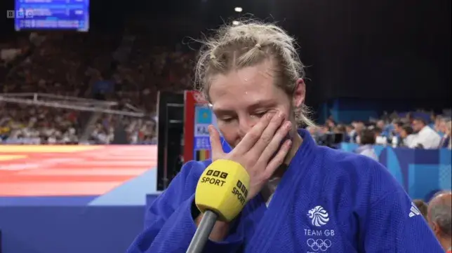 She was fighting back the tears. (BBC)