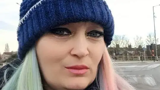 Zoe Carroll died at age 43, leaving behind her four children.