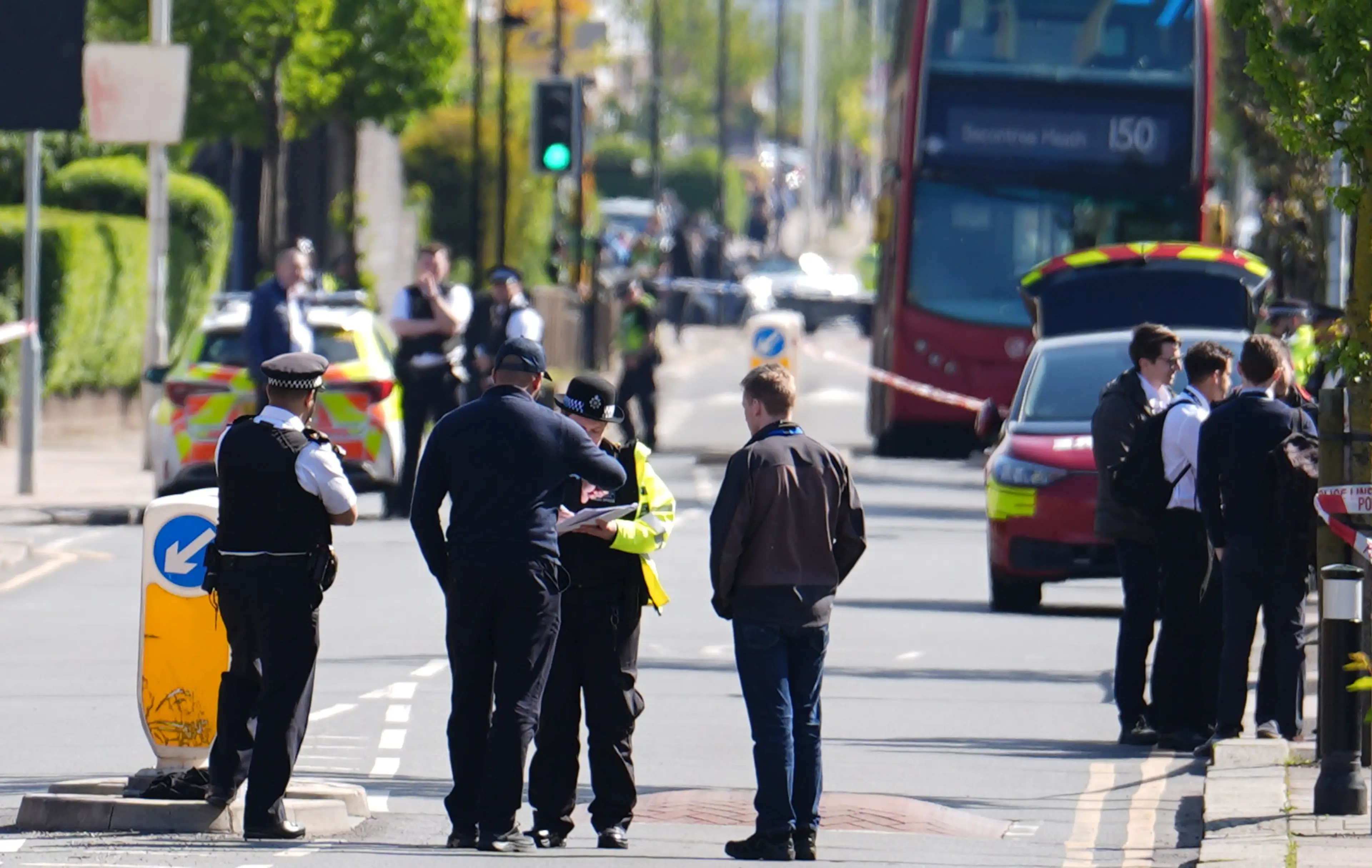 Police at the scene in Hainault. (PA Media)