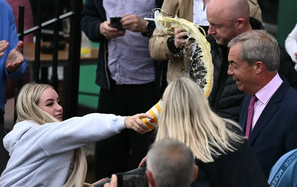 She caught him off guard, and people loved it. (BEN STANSALL/AFP via Getty Images)