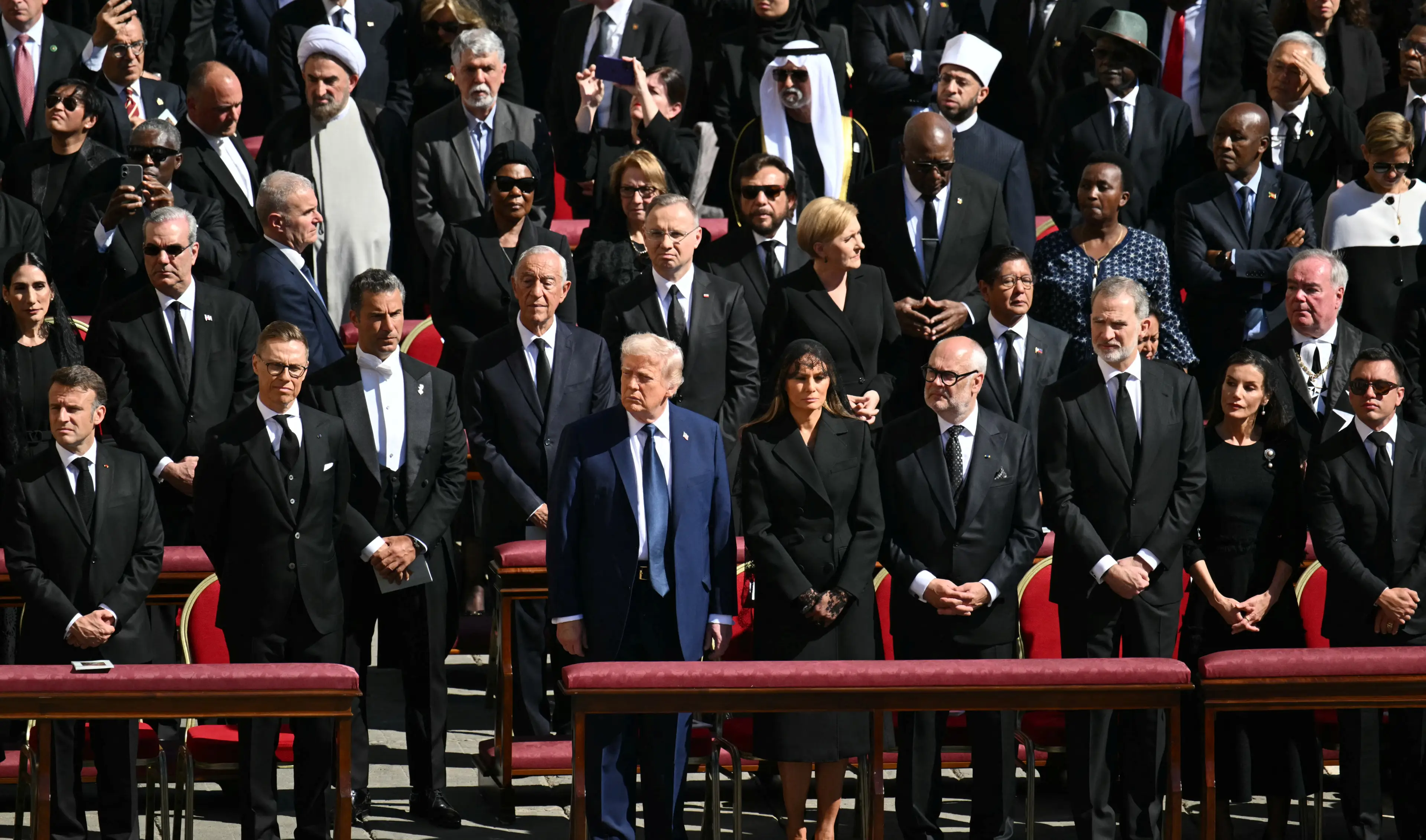 Viewers could spot Donald Trump a mile off among the sea of black suits (MANDEL NGAN/AFP via Getty Images)