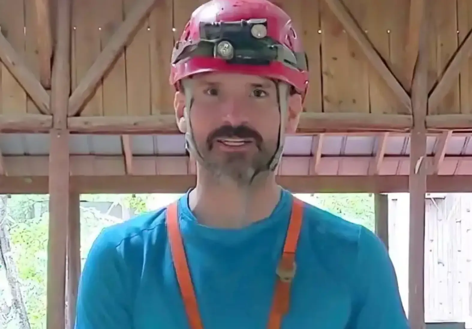 The cave explorer's condition has improved.