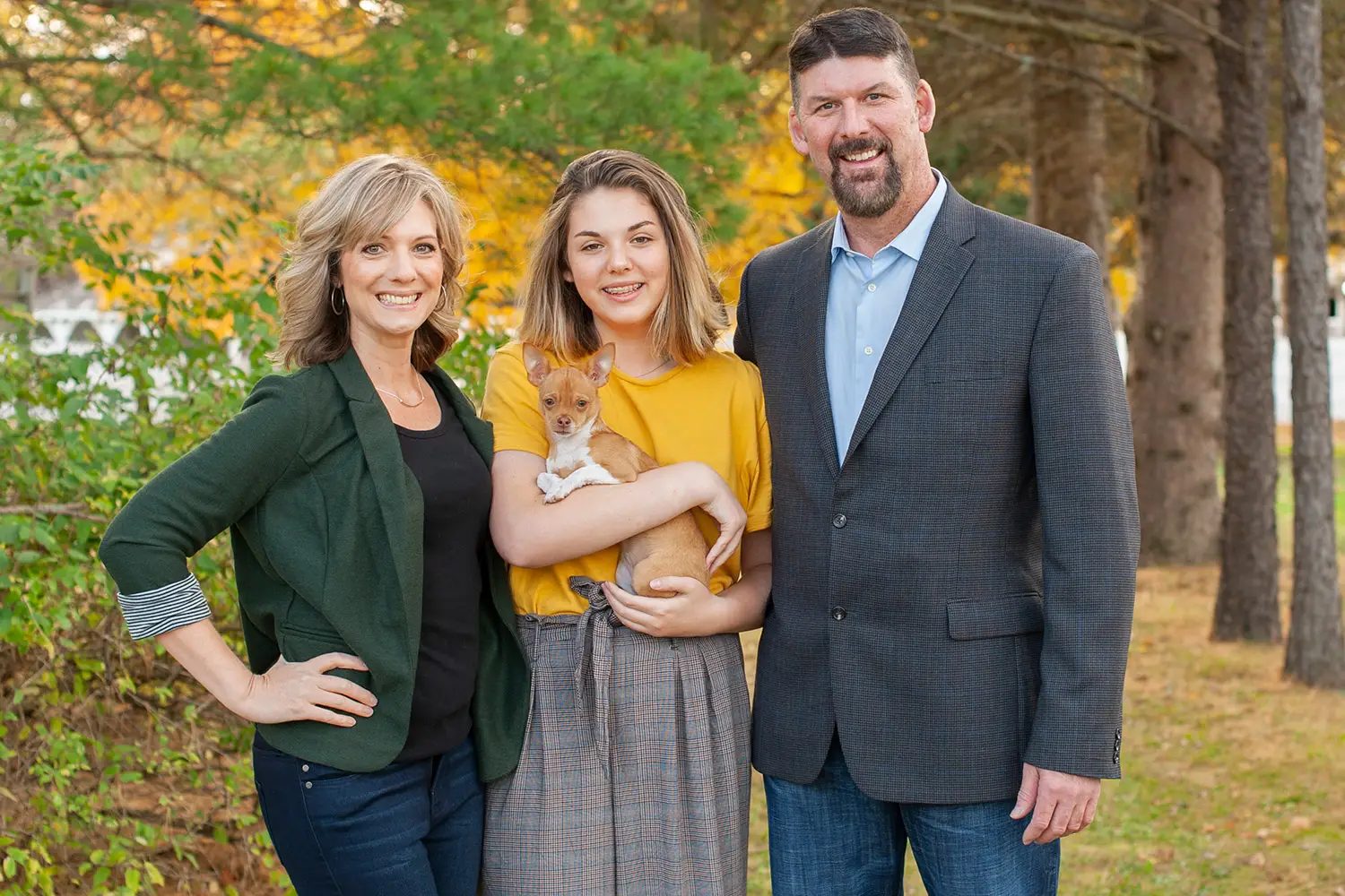 Emily with parents Kari and Tom.