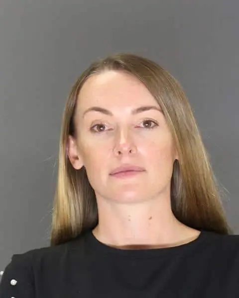 The pastor's wife Kaitlyn Regalado has also been charged (Denver District Attorney's Office)