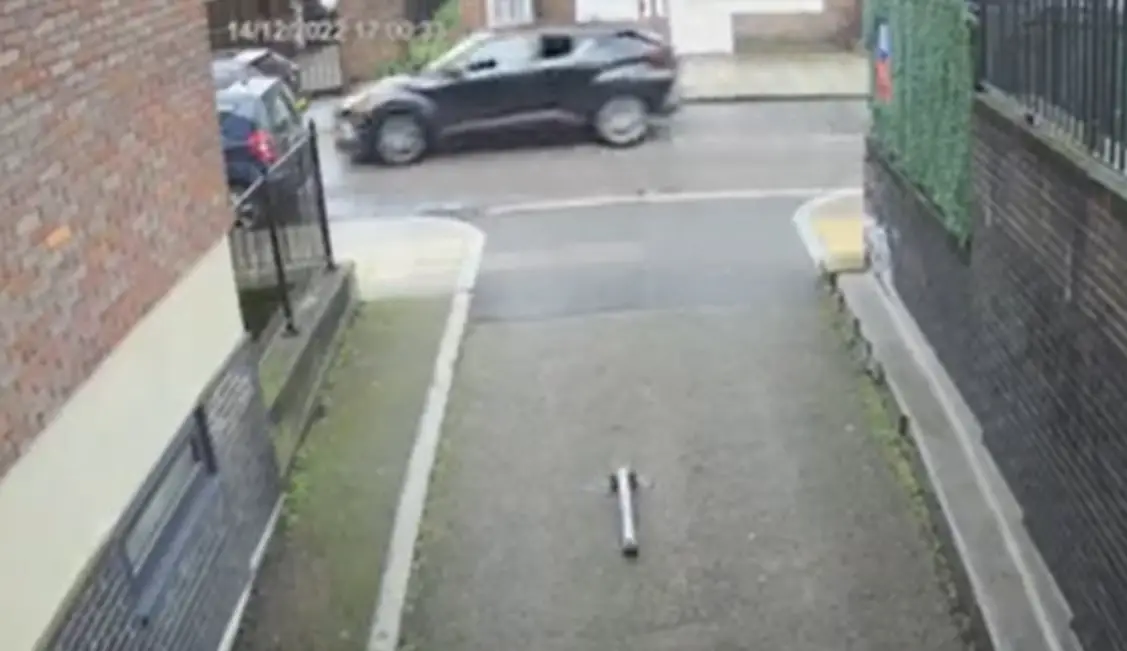 CCTV caught the moment the car with a window down drove by and opened fire.