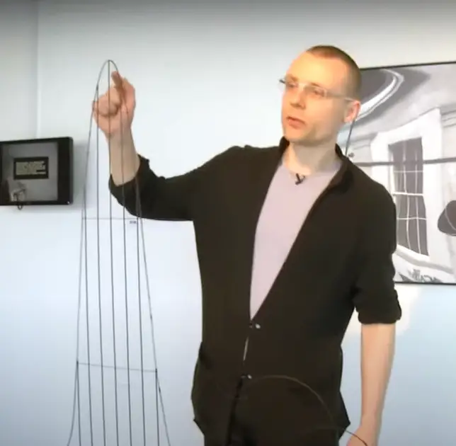 Julijonas Urbonas and his model of the Euthanasia Coaster (YouTube / Science Gallery Dublin)