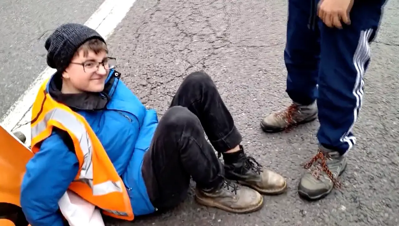 As one JSO member appeared to get a little too close to the car, their foot was subsequently run over in the process.