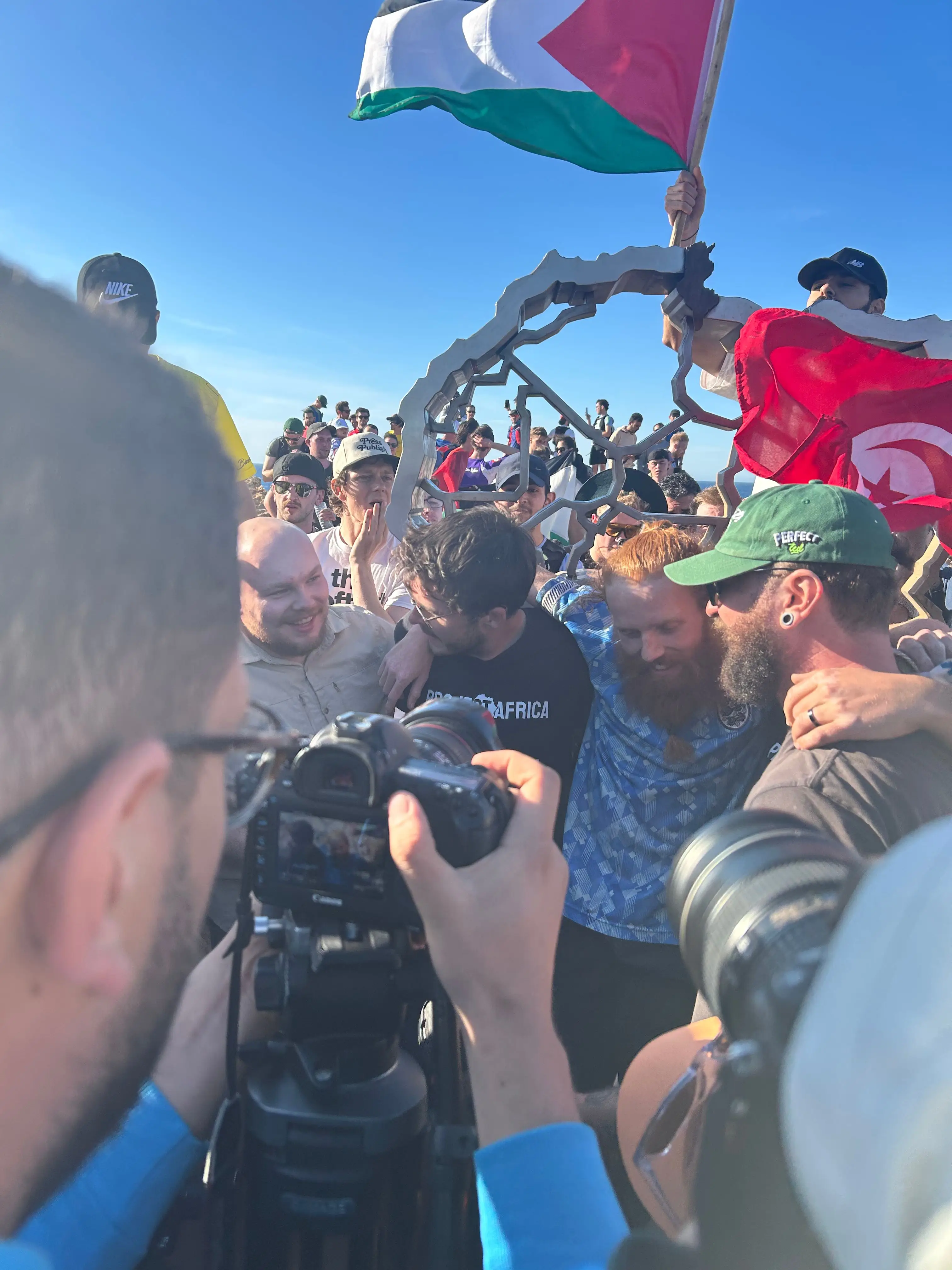 Russ hugged his team at the finishing line.