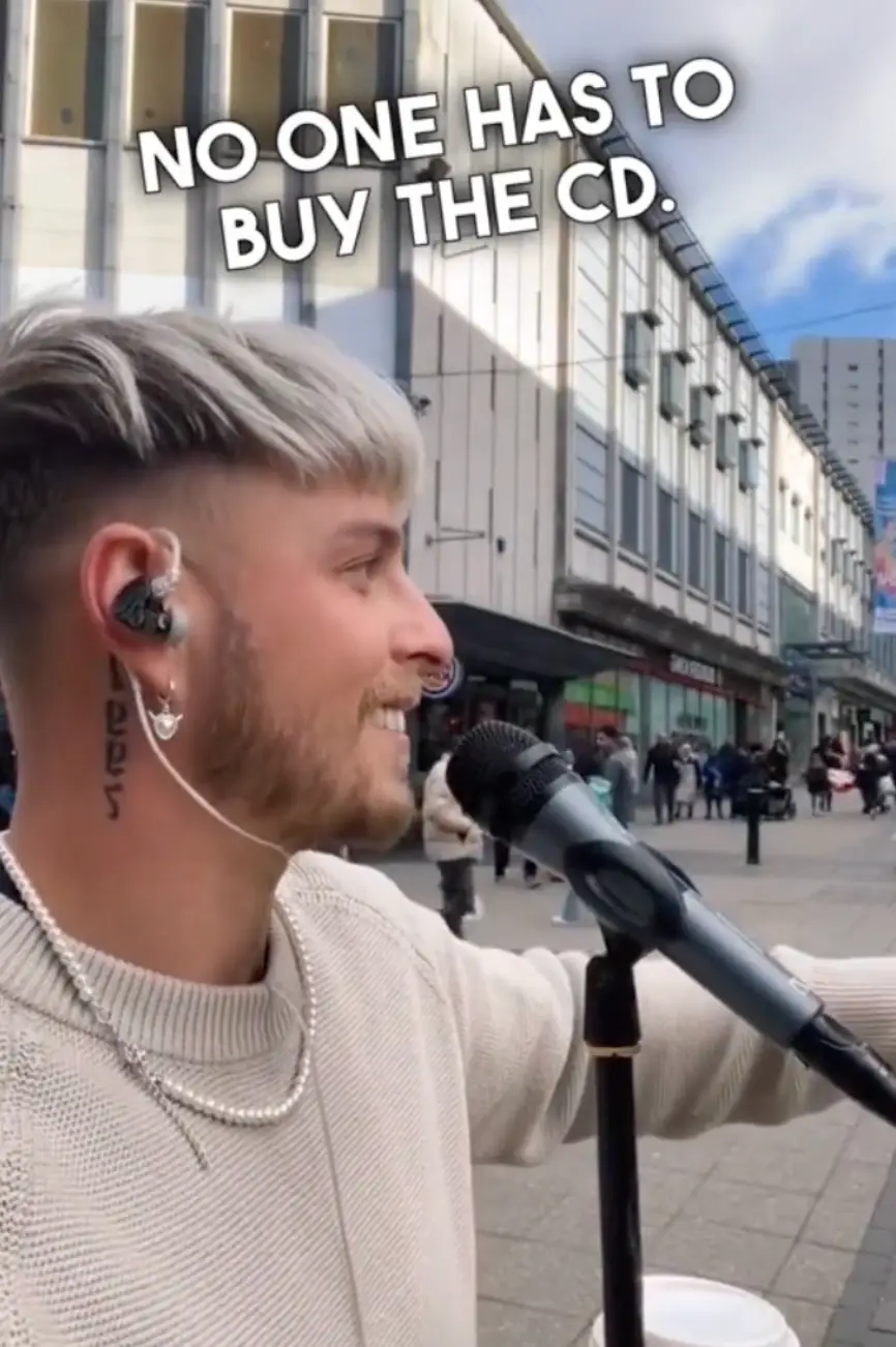 The woman was unhappy about the price of his CDs.