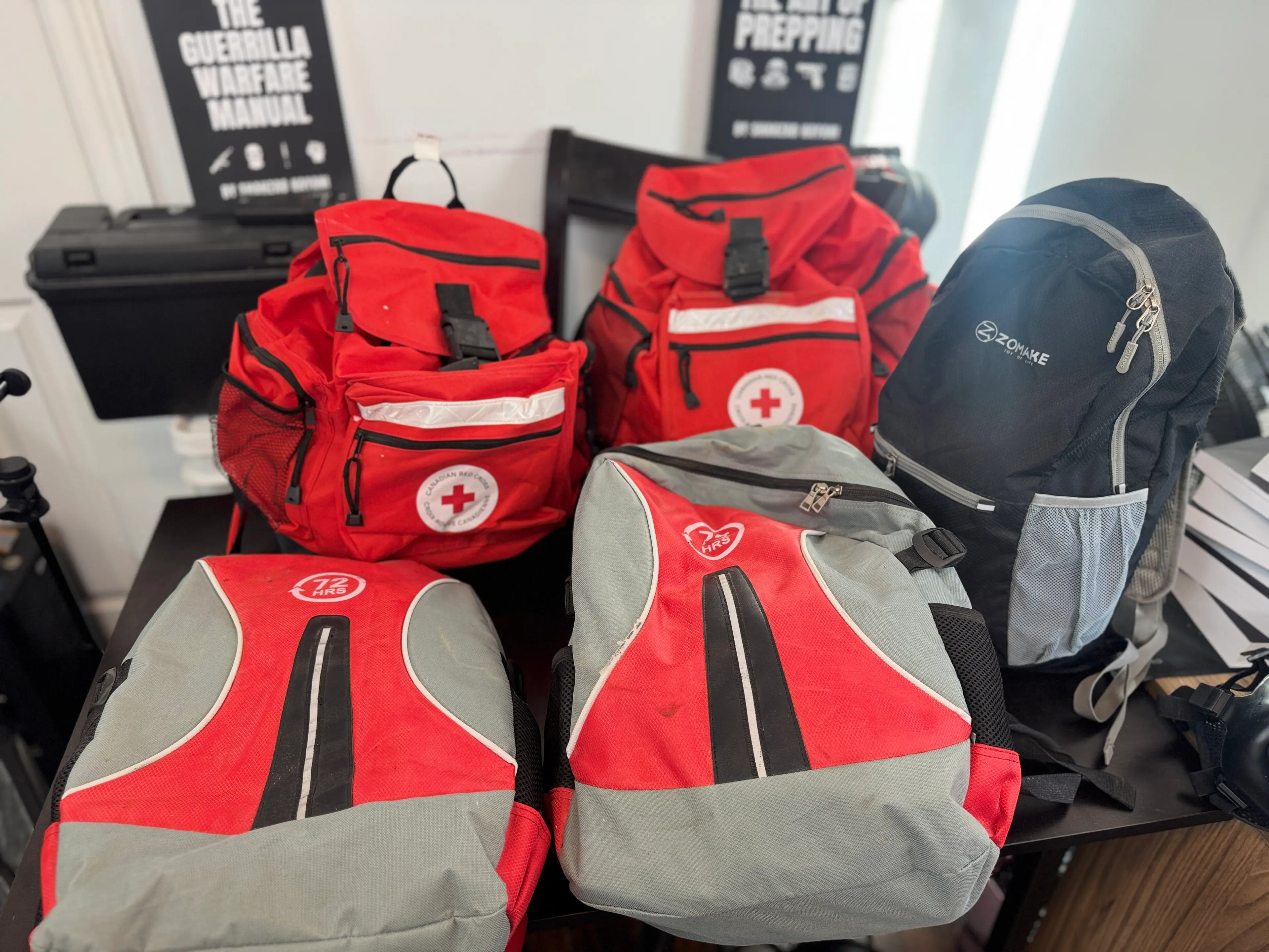 The doomsday prepper even has 'survival rucksacks' for his family members on standby in case they need to make a speedy escape (SWNS)