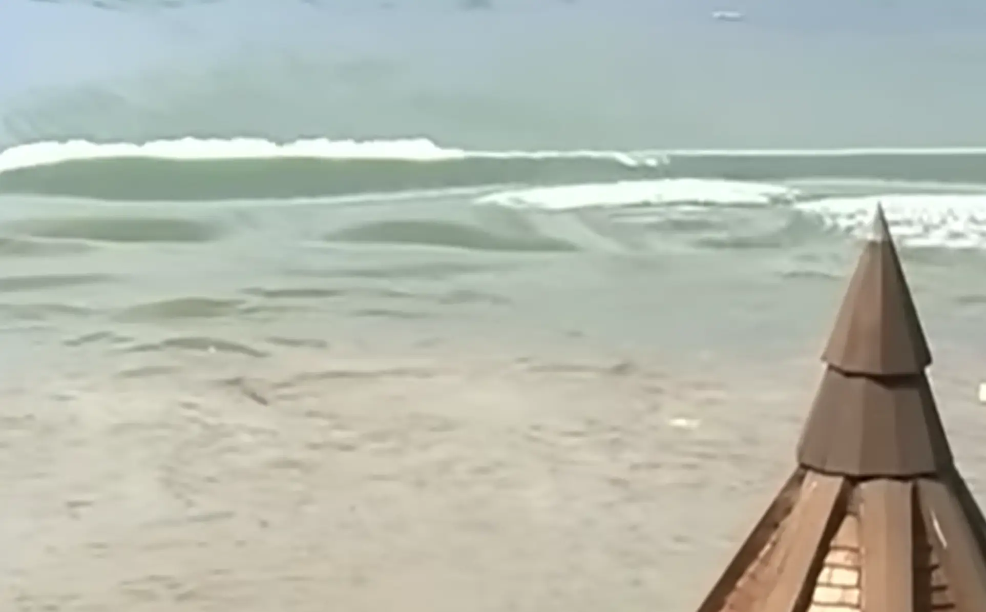 Footage of the tsunami showed the waves moving away from the beach (YouTube/Pilot90)