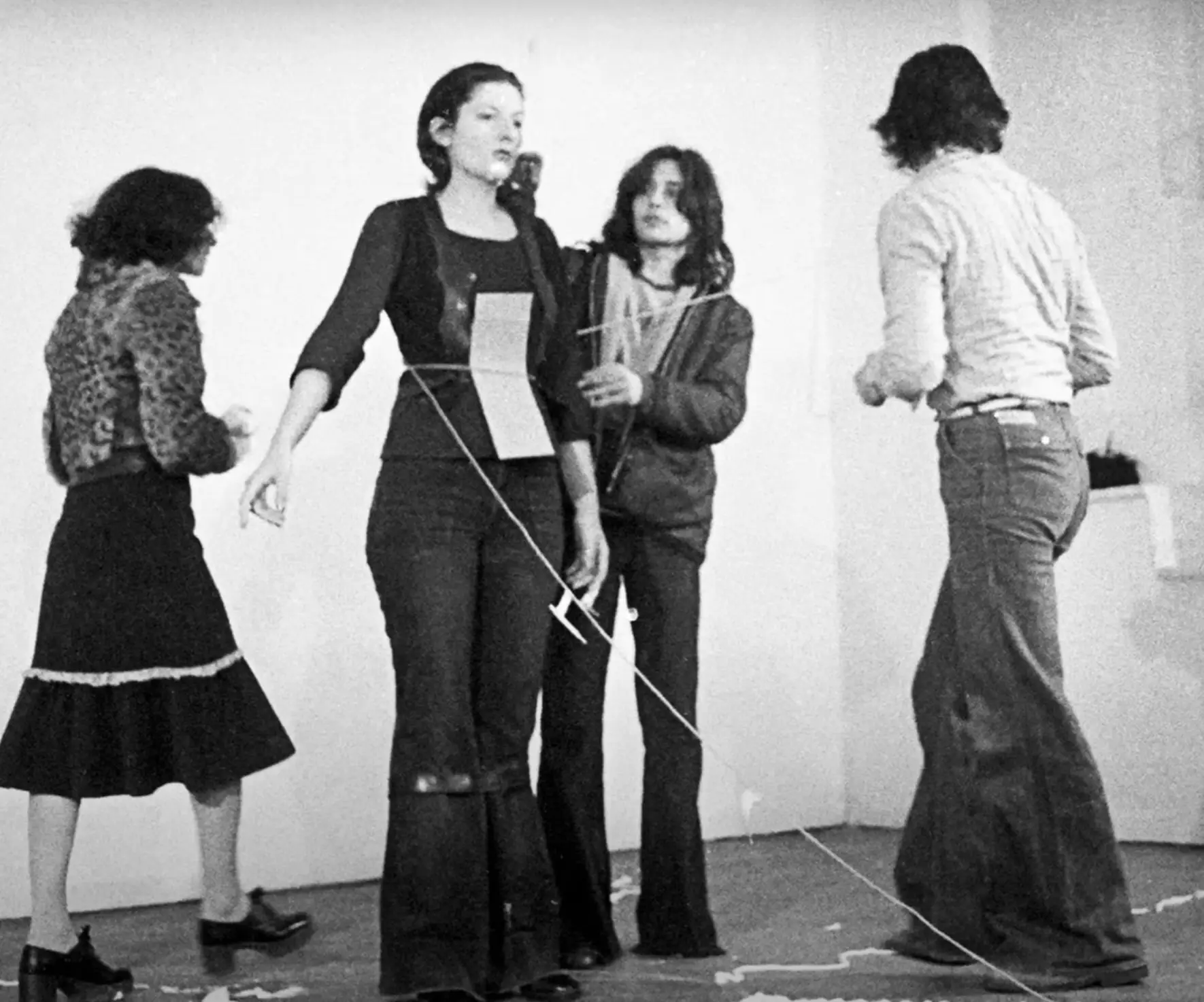 Marina Abramovic during the performance of Rhythm 0 (Marina Abramovic Institute / YouTube)