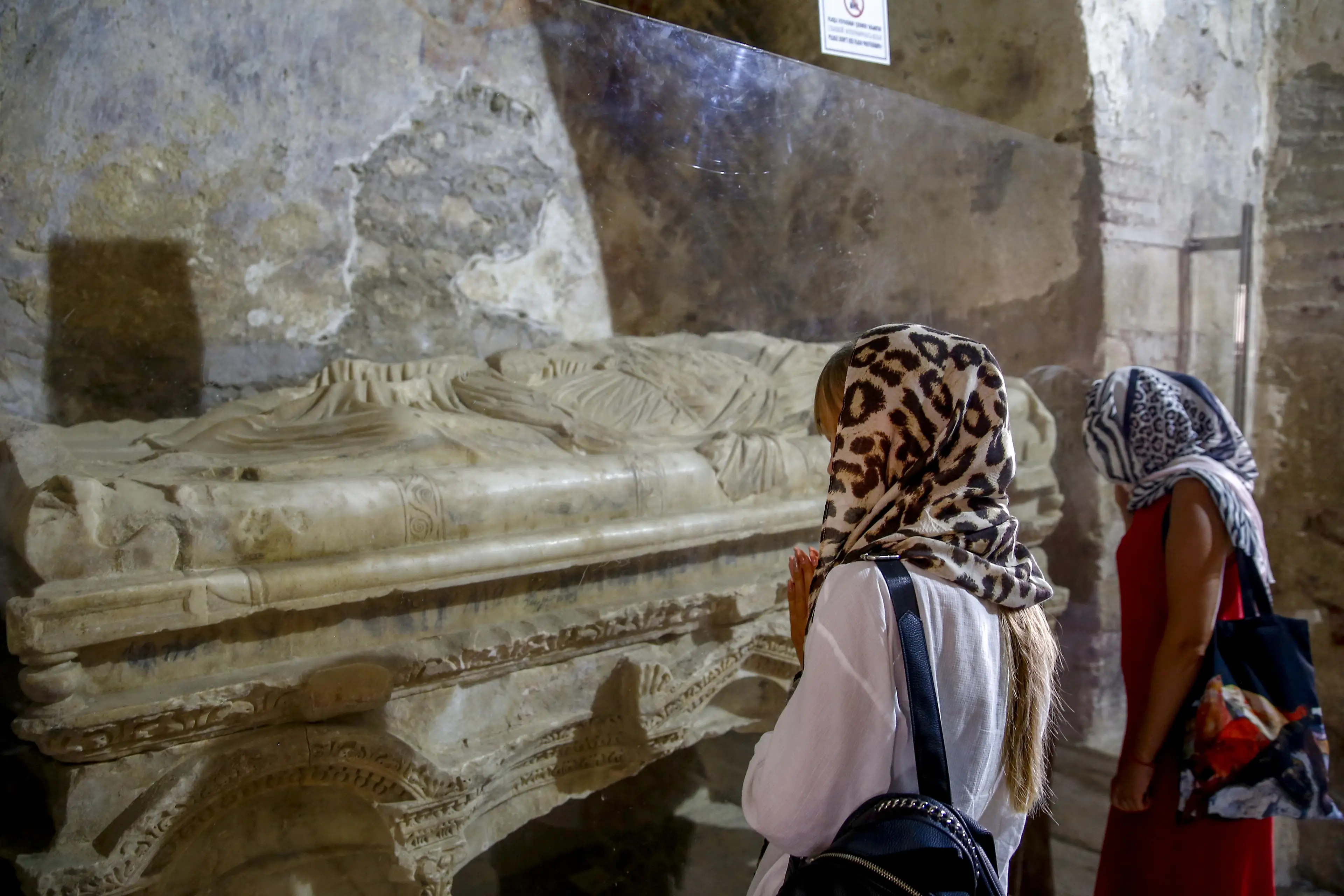 People praying at St. Nicholas Church in Demre district of Antalya, Turkey.