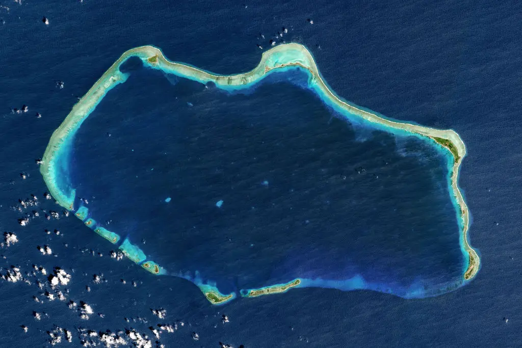 Bikini Atoll from above; the crater in the top left caused by the explosion of the 15 megaton Castle Bravo nuclear bomb (Copernicus Sentinel Data 2017/Orbital Horizon/Gallo Images/Getty)
