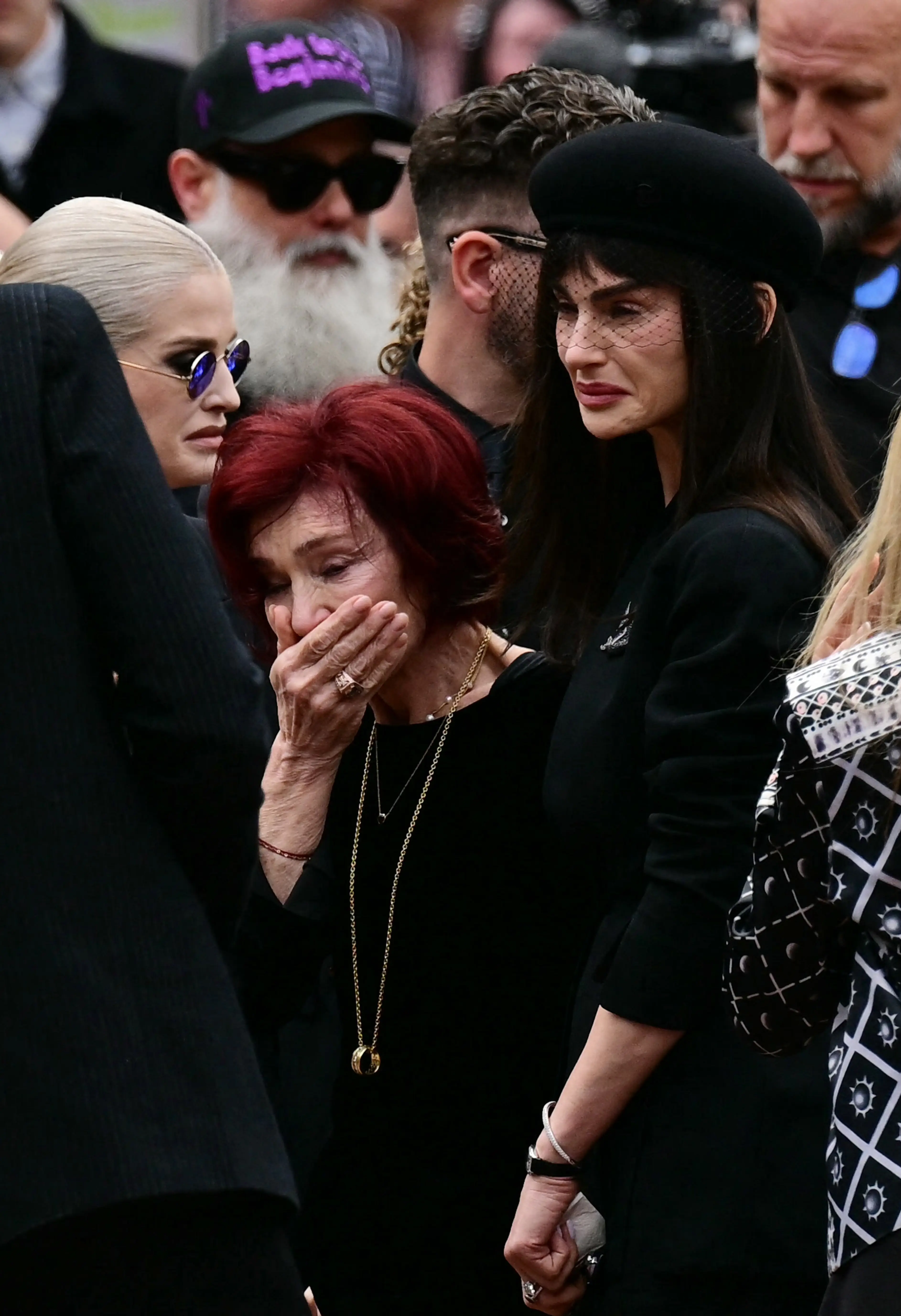 Aimee made a rare public appearance at the rockstar's funeral yesterday (BEN STANSALL/AFP via Getty Images)