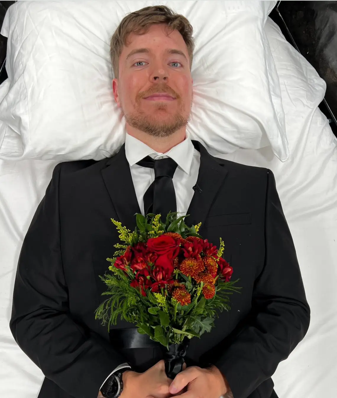 Guy's thinking about views in death. (YouTube/@MrBeast)