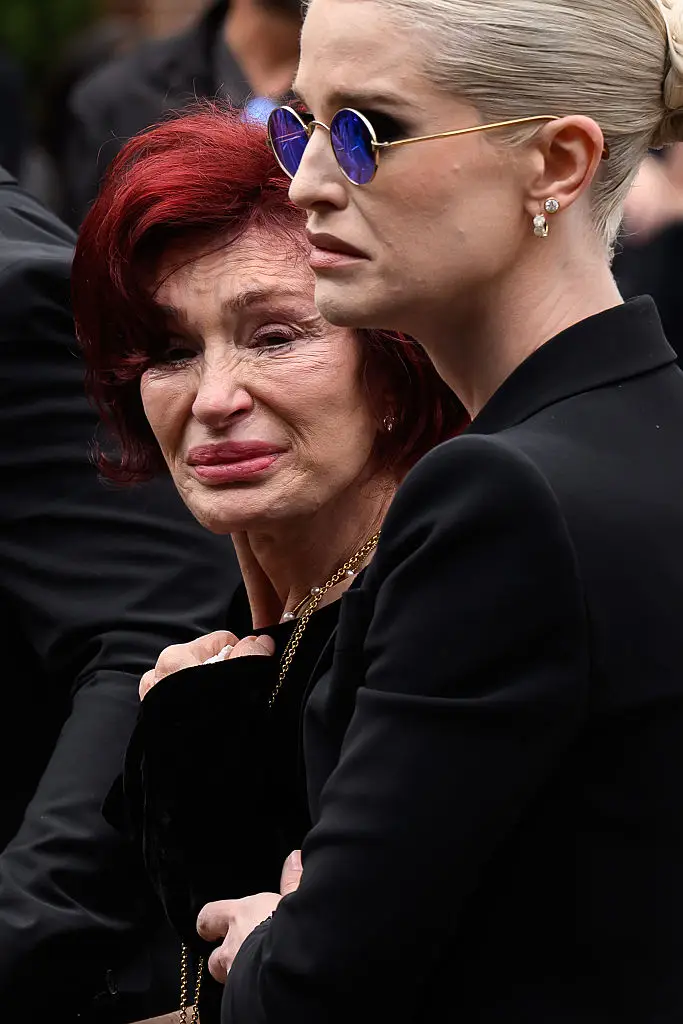 Kelly was sporting a pair of round sunglasses, which became part of the 'Ozzy Osbourne uniform' (Leon Neal/Getty Images)