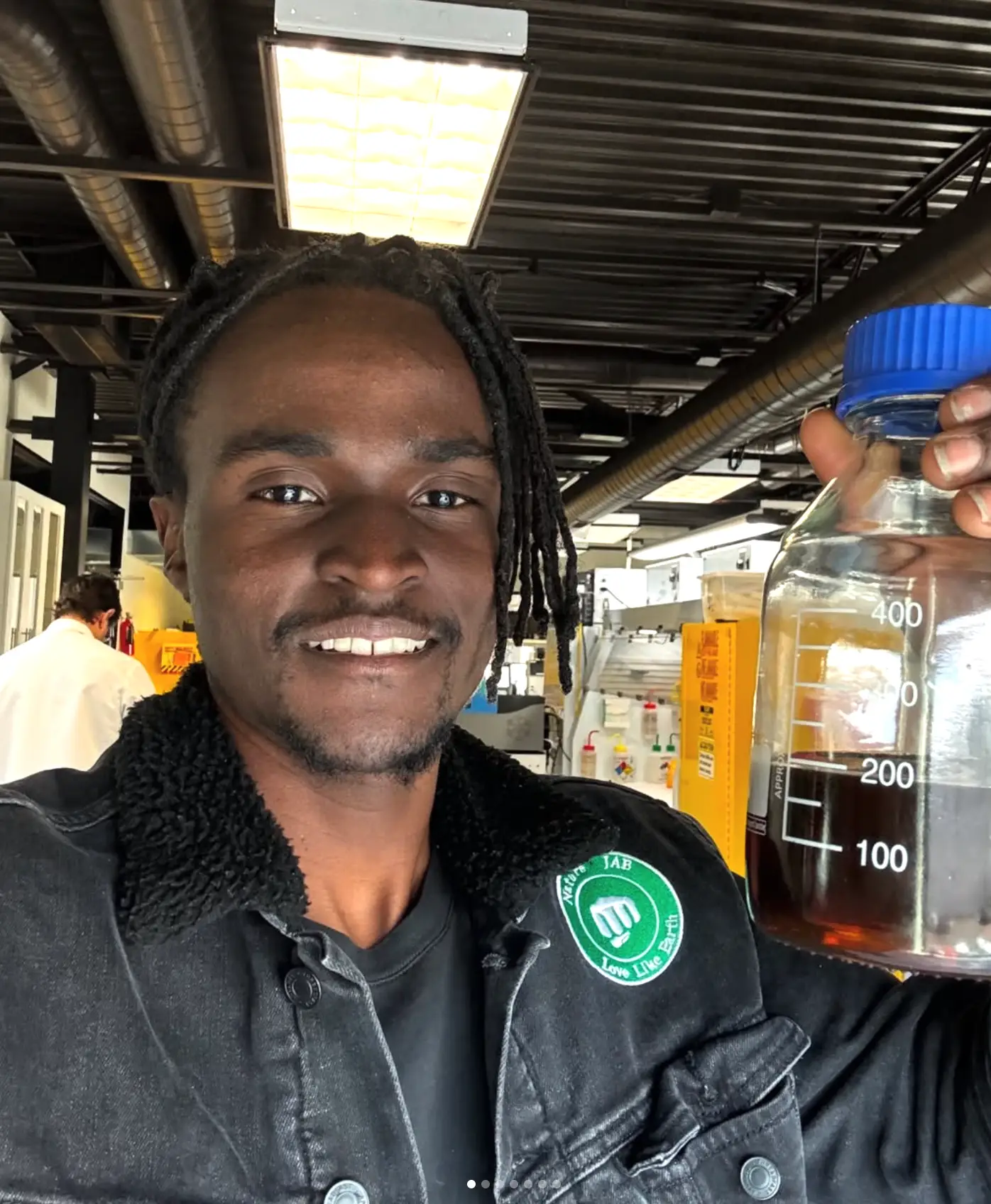 Julian holding the diesel he made from plastic waste (NatureJab/Instagram)