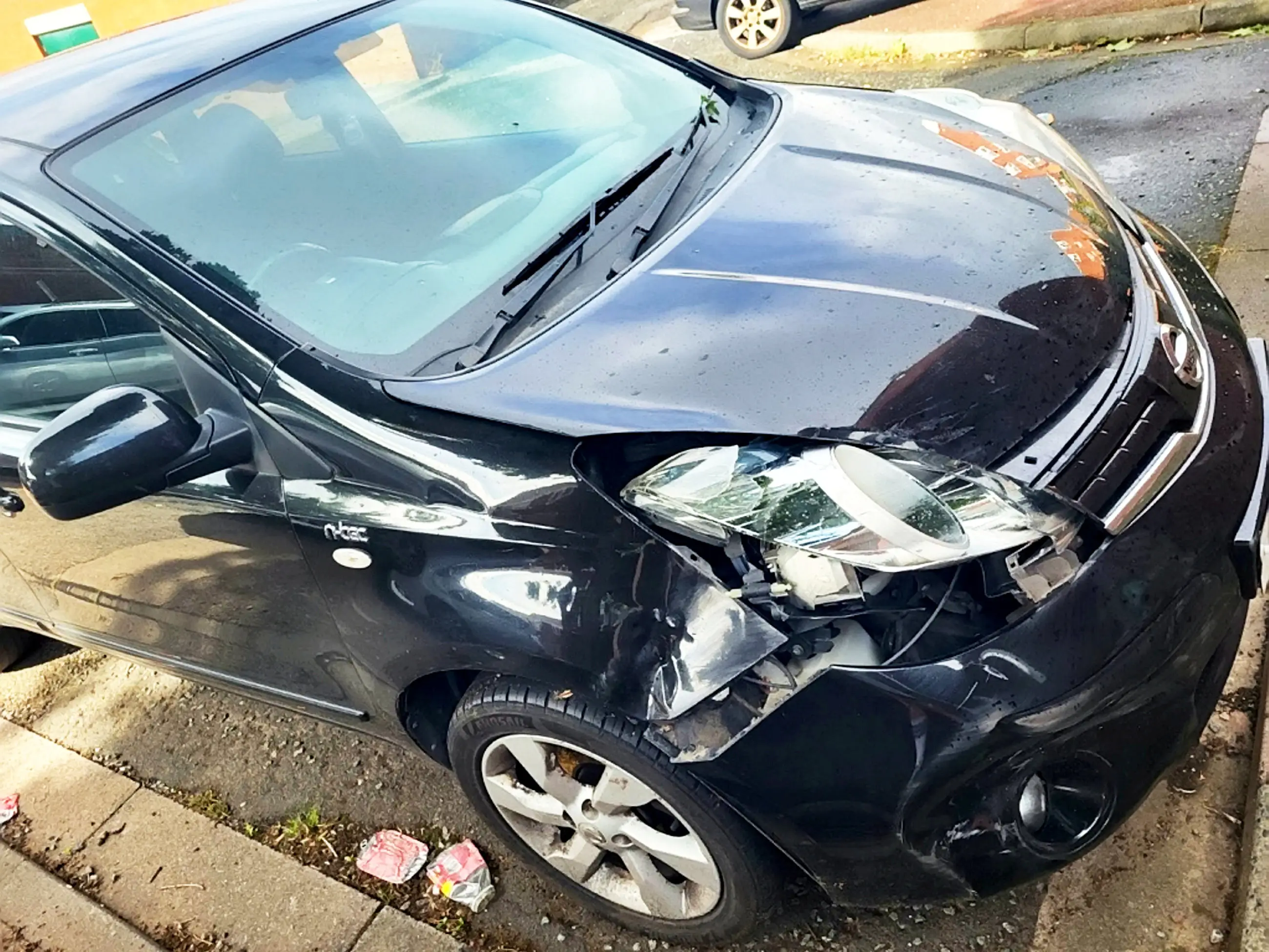 The family's car was left completely smashed up.