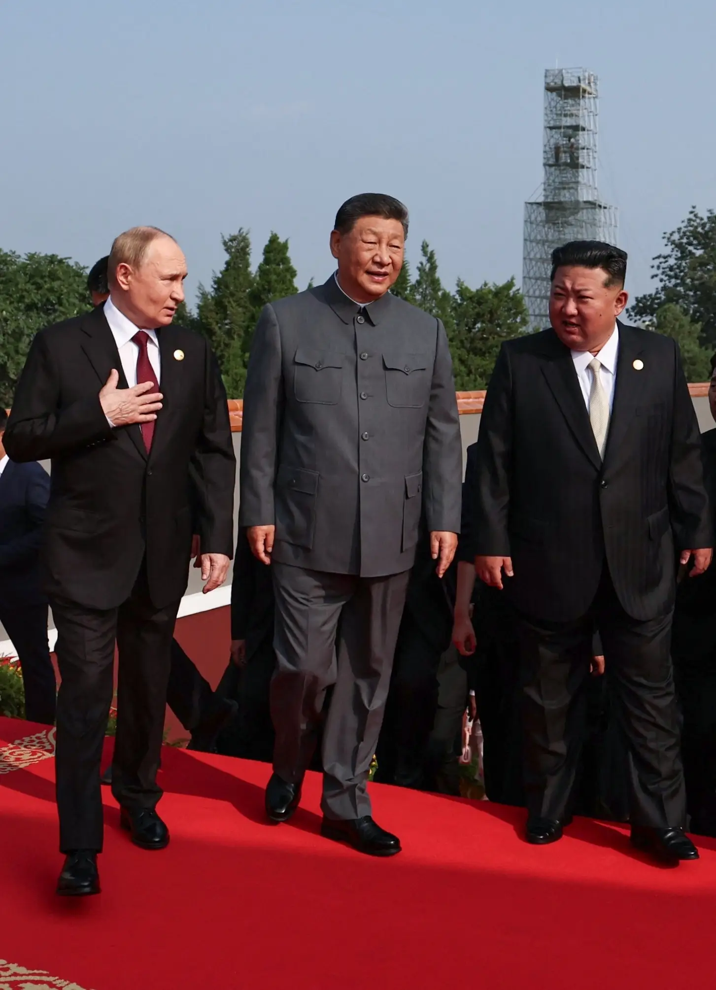 Vladimir Putin, Xi Jinping and Kim Jong-Un were pictured walking together at China's V-Day parade (Alexander Kazakov/Getty)