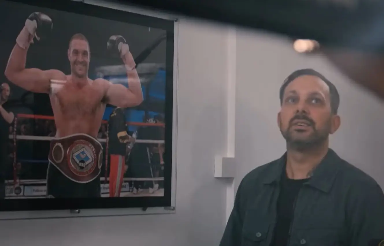 Frayne pulled off another trick where he made Fury's prize belt disappear from this picture.