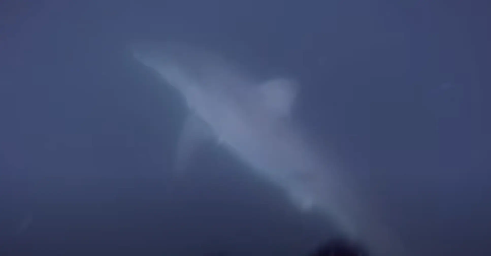 He spotted the shark below his flippers (YouTube/GoPro) 