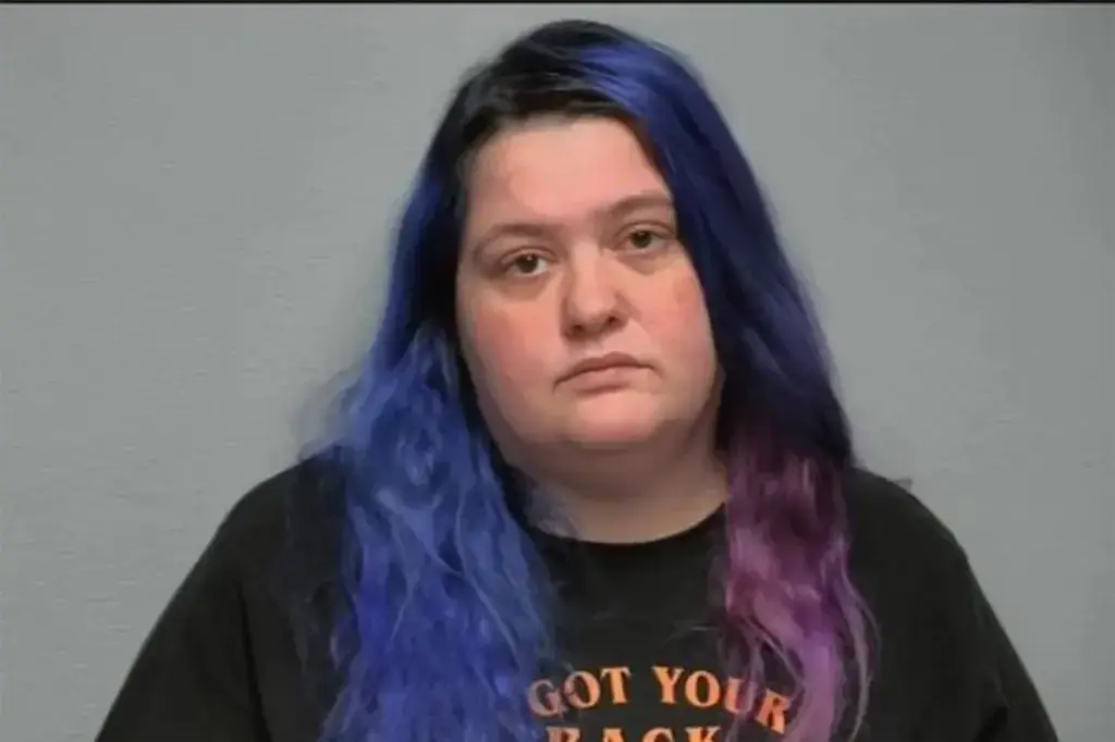 The DoorDash driver has been arrested on felony Battery and Consumer Product Tampering charges (Police handout)