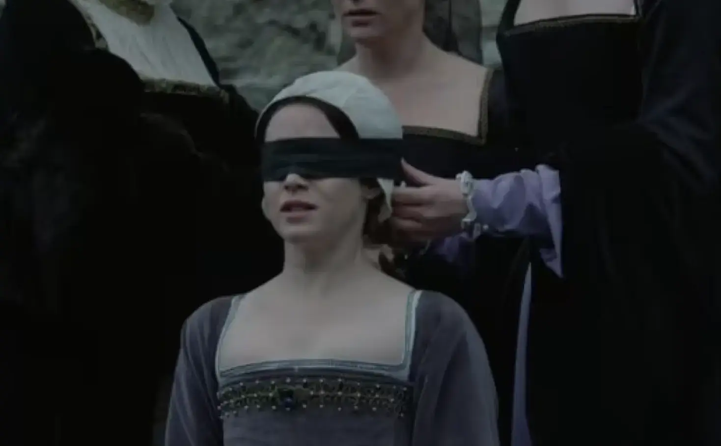 Boleyn can be seen looking fearful throughout the scene, up until her beheading (BBC)