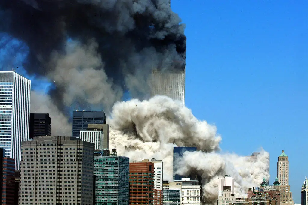 The World Trade Center burning in the aftermath of the attack (HENNY RAY ABRAMS/AFP via Getty Images)