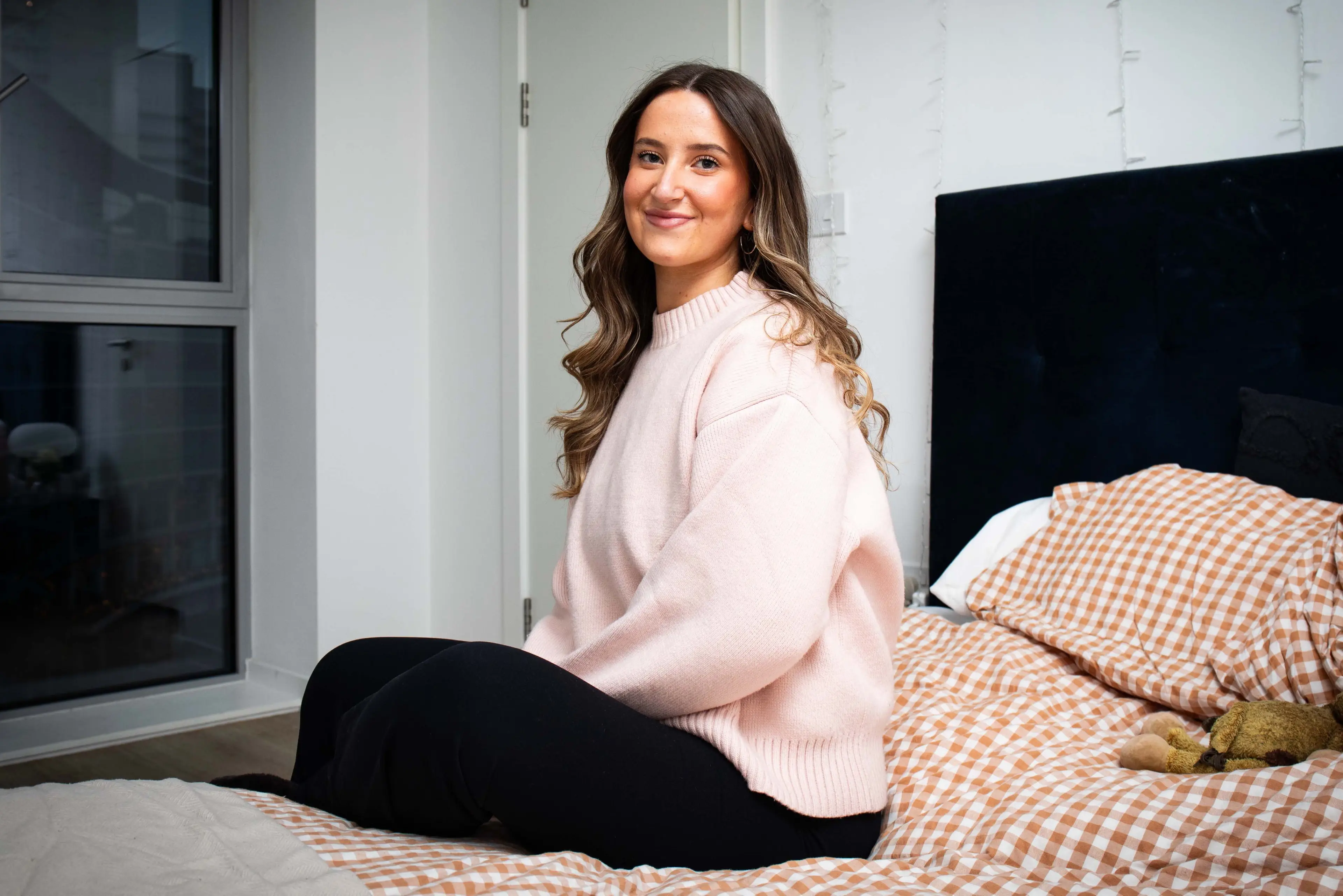 The 22-year-old, who works in Digital PR in Manchester, switched jobs when she was younger because of her condition (SWNS)