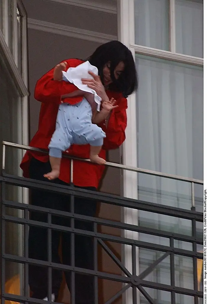 MJ would later apologise for dangling his baby out of a balcony window (Peter Bischoff/Getty Images)