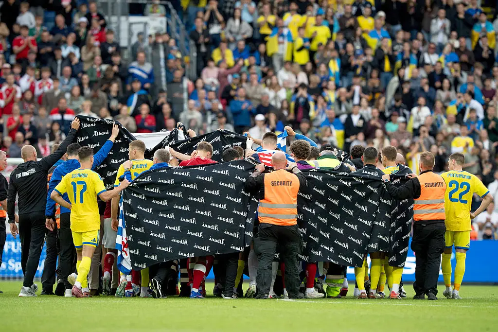 Players from both sides once again formed a human shield as Eriksen received treatment (Bo Amstrup / Ritzau Scanpix / AFP via Getty Images)