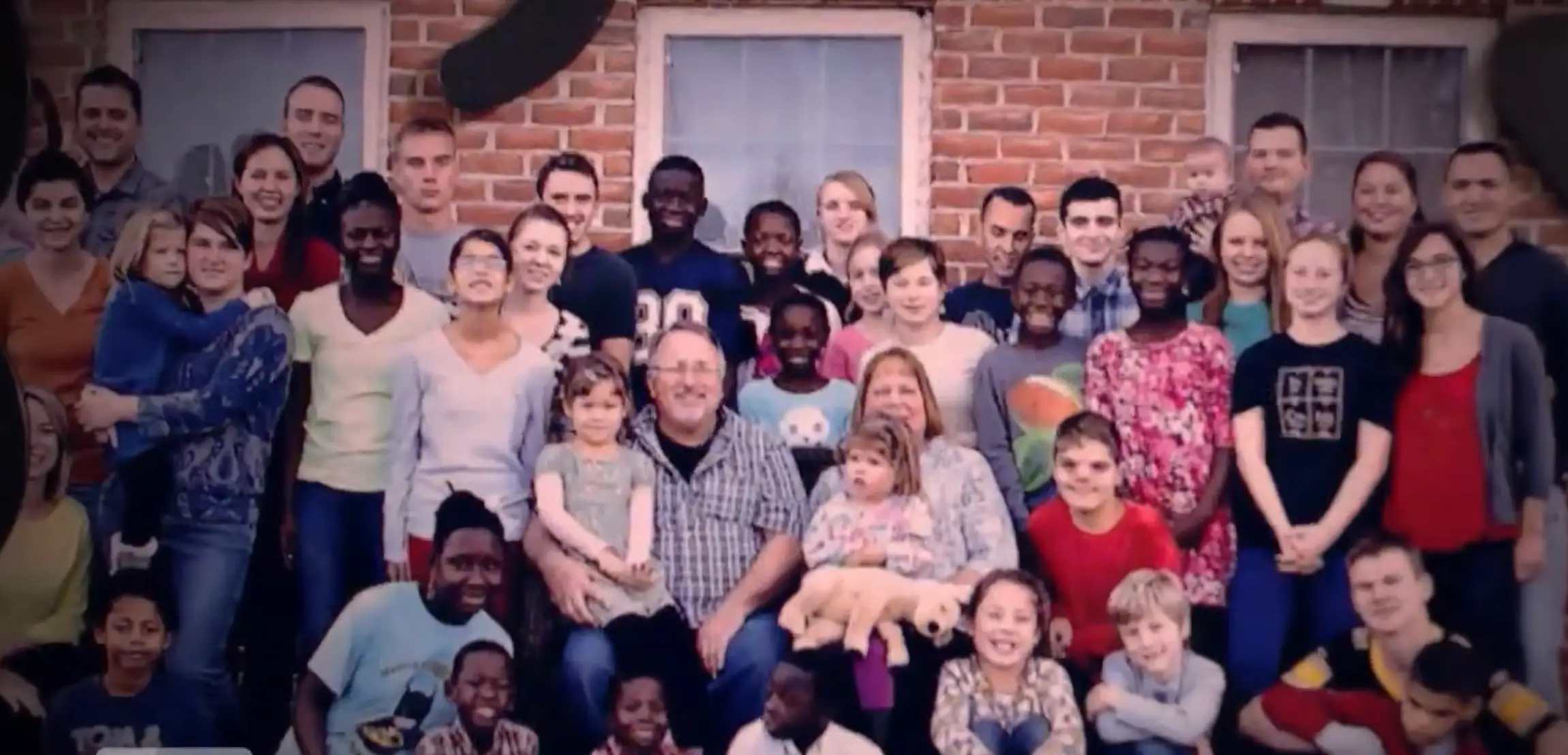 The huge family is made up of Paul, Jeane, five of their biological kids and 32 adopted children (Inside Edition)